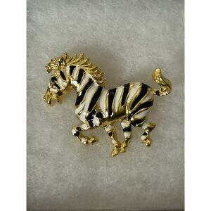 Lovely Gold Tone Enamel Zebra Brooch. Measures 1.75”